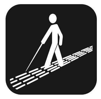 Piktogram af ledelinje og person med synshandicap.